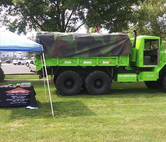 green servpro military looking truck
