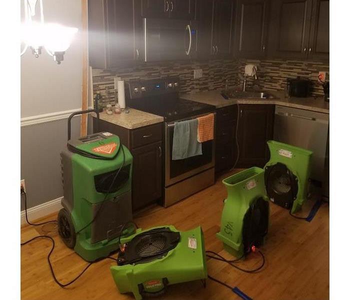 SERVPRO equipment in the kitchen of a home